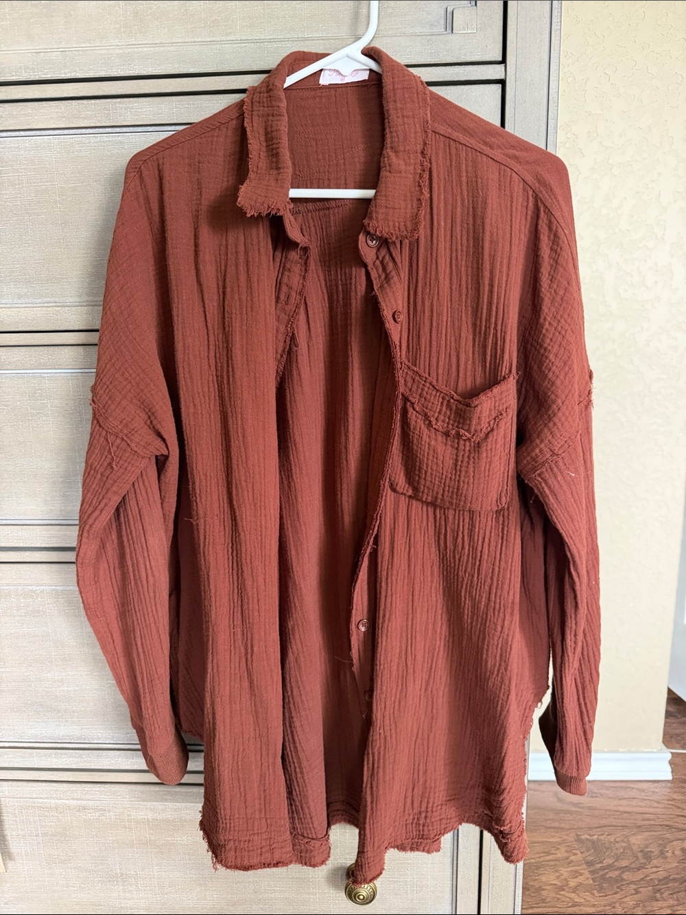Pink lily gauze-y top. Warm brown